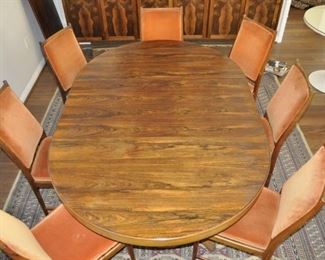 Mid-Century Rosewood (Extending up to 12 feet)  Dining Table by Niels Otto Møller for
Gudme Mobelfabrik, table comes with 5 leaves