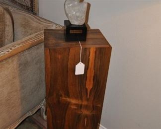 marble sculpture by Leon Saulter with pedestal