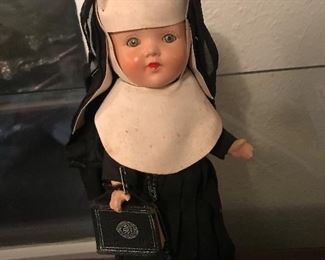 19th century nun doll with Bible and rosary 
