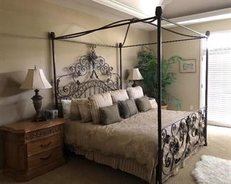 Iron Canopy bed with ornate headboard