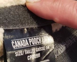 Canada Pooch size 14 ... about poodle size.
Hudson's Bay Company Official Olympic dog coat. Vancouver 2010. Size M