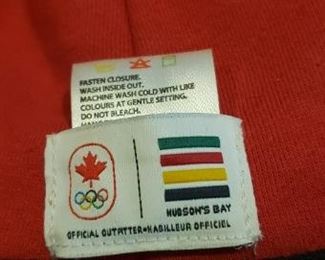 Canada Pooch size 14 ... about poodle size.
Hudson's Bay Company Official Olympic dog coat. Vancouver 2010. Size M