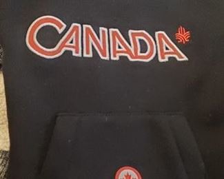 Canada Pooch size 14 ... about poodle size.
Hudson's Bay Company Official Olympic dog coat. Vancouver 2010. Size M