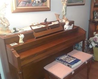 Spinet piano and bench