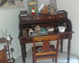 Old desk with folding front  and drawers across top
