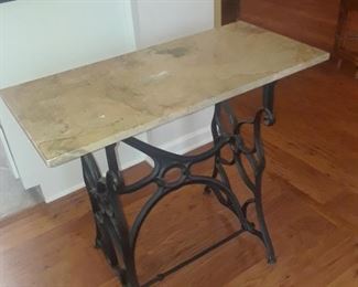Metal base with marble top table