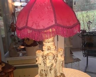 Cherub lamp with fringed shade