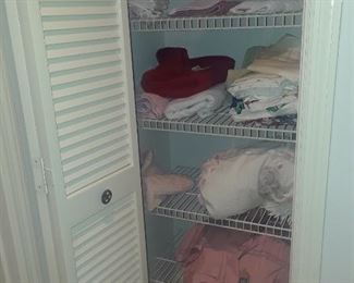 One of two closets full of linens