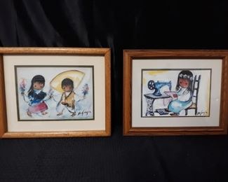 2 Framed Prints by De Grazia. The Sewing Machine