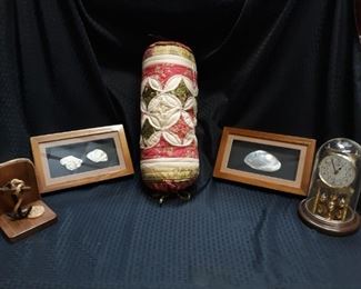 Seashell frames, clock, anchor bookend and a decorative pillow