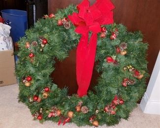 at least 14 Christmas wreaths