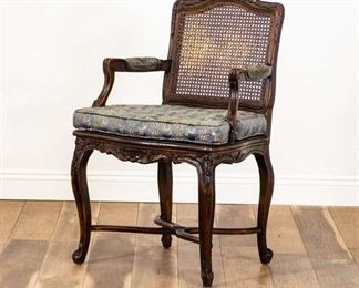 Cane Back Dark Wood Armchair W/ Carved Detail
