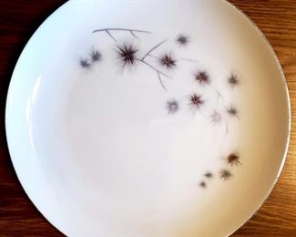 Large set of silver rimmed china dishes