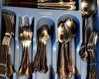Eight settings stainless flatware & serving pieces