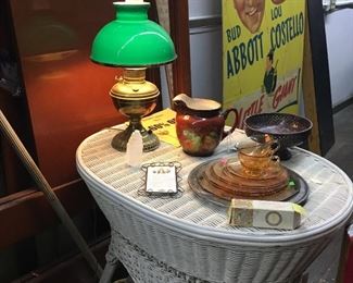 Vintage Lamp, Movie Poster, Glassware, and Wicker Table