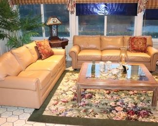 Leather Sofas, Floral Rug and Wood & Glass Square Coffee Table