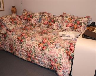 Twin Bed and Floral Spread with Matching Pillows