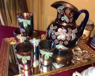 Vintage Carnival Glass Pitch with matching glasses. 