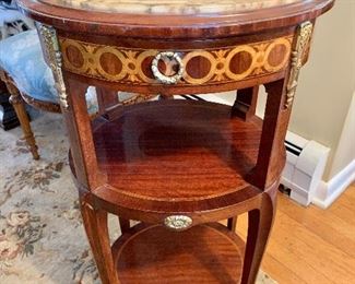 Round inlaid marble top shelf with drawer
