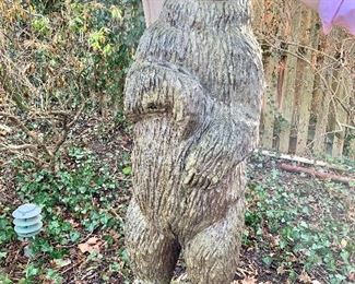 Tall wooden bear statue