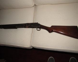 Antique shotgun 1897 Winchester pump style