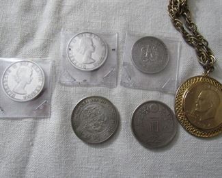 Silver dollars from Canada, Mexico and Japan