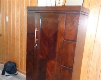 front of the locking bar/liquor cabinet