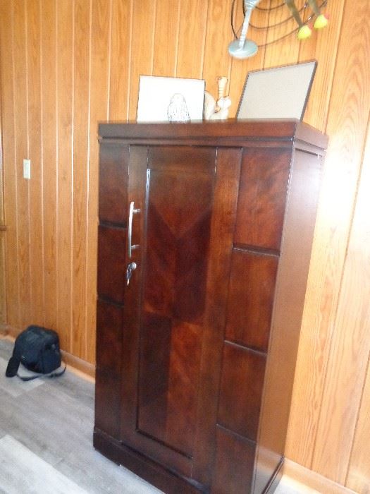 front of the locking bar/liquor cabinet