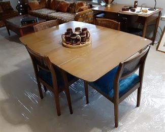 Dining table with 5 chairs and 3 leaves