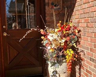 Large pottery vase and silk flowers