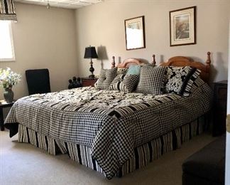 King size bed, black and white comforter, skirt and shams