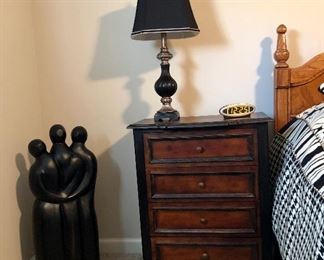 4 drawer side table , lamp and 3 person statue