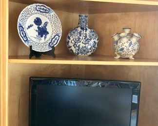 Small Samsung TV, blue plate and vases