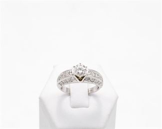 Round Brilliant 1.05 Ct Solitaire ring set in 14k white gold containing 28 round brilliant cut diamonds of 1.00 Ct total weight. 