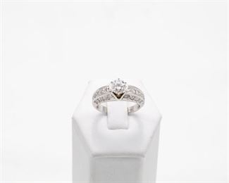 Round Brilliant 1.05 Ct Solitaire ring set in 14k white gold containing 28 round brilliant cut diamonds of 1.00 Ct total weight. 