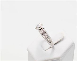 Round Brilliant 1.05 Ct Solitaire ring set in 14k white gold containing 28 round brilliant cut diamonds of 1.00 Ct total weight. 