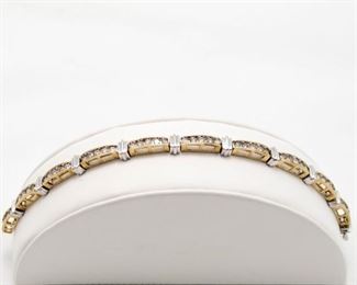 10k yellow gold diamond bracelet with total diamond weight of 2.50Ct.  "the diamonds are knife set"