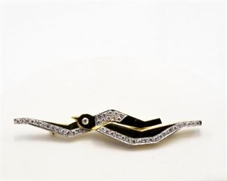 18k yellow gold brooch with total diamond weight 1.00 Ct.