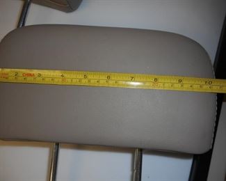 2 Tan Leather automobile head rests