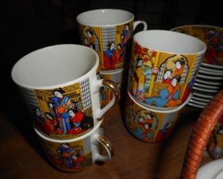 Asian Tea set includes tea pot & service for 12 but 1 missing saucer