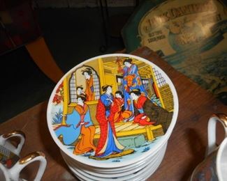 Asian Tea set includes tea pot & service for 12 but 1 missing saucer