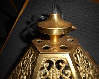 Ornate Asian brass hanging light with chain