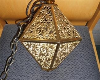 Ornate Asian brass hanging light with chain