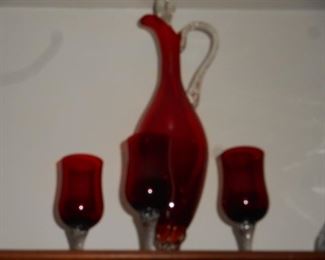 Ruby red decanter with 3 stemmed glasses