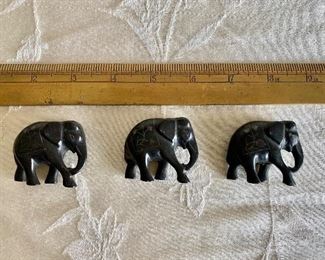 3 small metal, etched elephants
