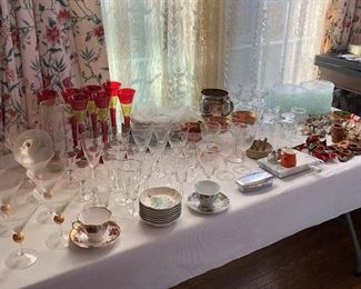 TABLES ARE FULL OF COLLECTABLE GLASS