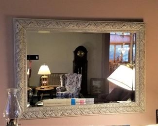 Lovely silver mirror. Everything is like new in this home. Everything has been taken care of with kit gloves.