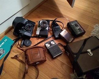 Lots of vintage cameras and electonics