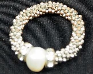 Collection Of Costume Jewelry, Includes Necklaces, Bracelets, And Earrings