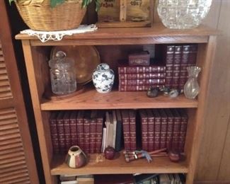 Book cases, collectible books and shelf sitters